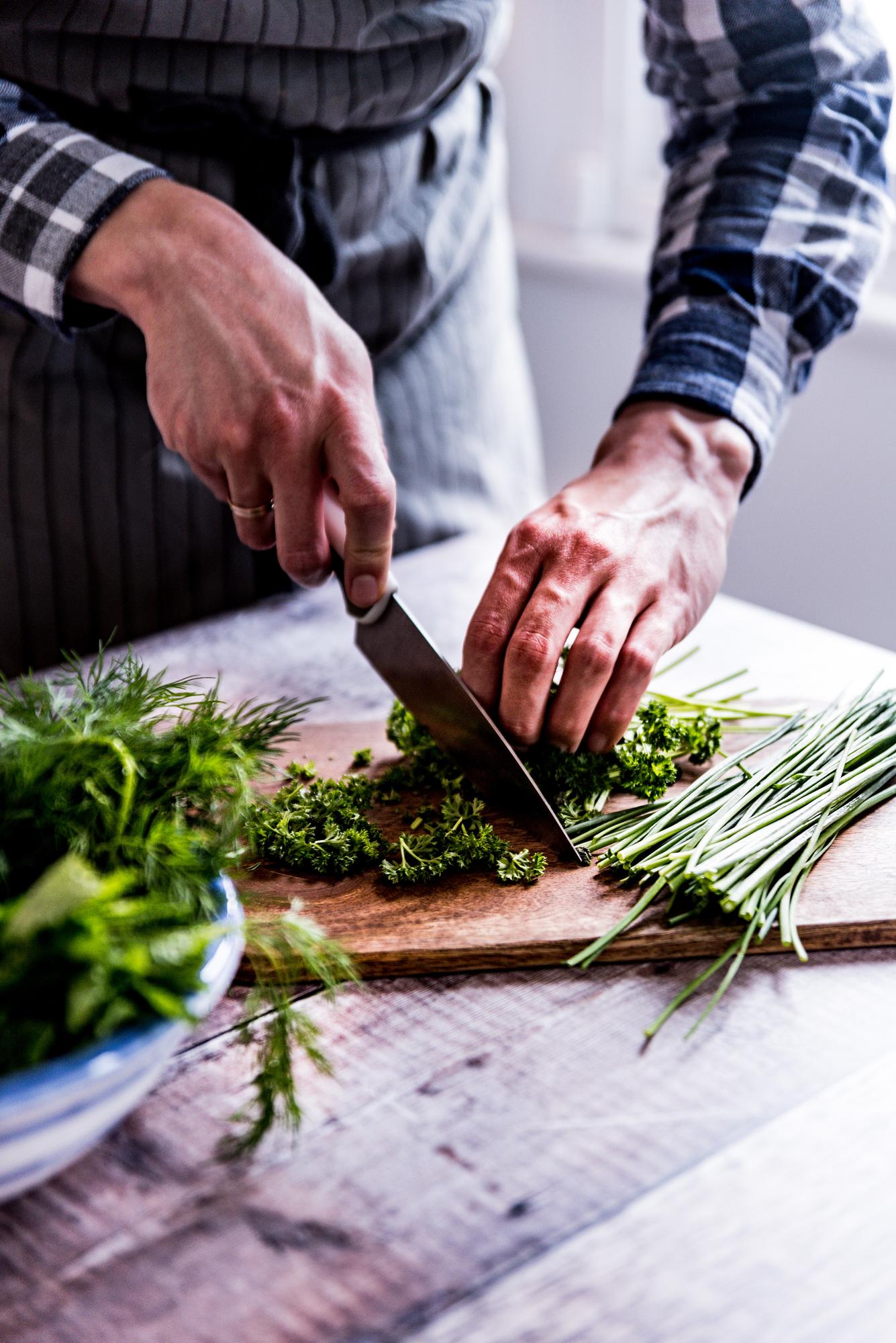 Student chopping herbs